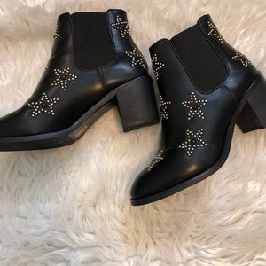 Black heeled boots with star studs